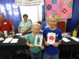 Happy young quilt designers