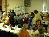 The Crowd Anxiously Awaits Quilt Raffle