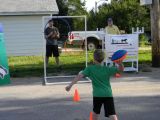 Austen and Jay run the Football Toss