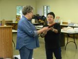 Sherry Presents Judy with an Award from International