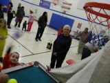 Nancy Watches a Young Player